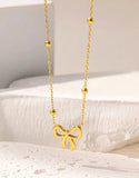 StainMinimalist Gold Plated Stainless Steel Bow Shaped Locket Set (DZ18372)