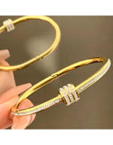 Gold Plated Rhinestone Studded Bangle Bracelet in Stainless Steel Finish (DZ18401)
