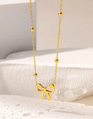 StainMinimalist Gold Plated Stainless Steel Bow Shaped Locket Set (DZ18372)
